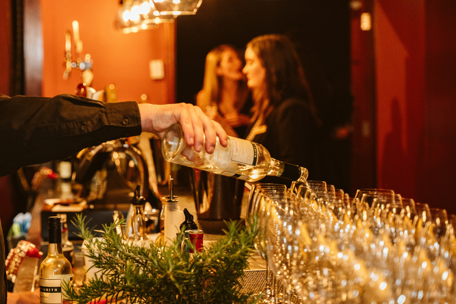 Bartender pouring drinks at the Ruby Lounge bar